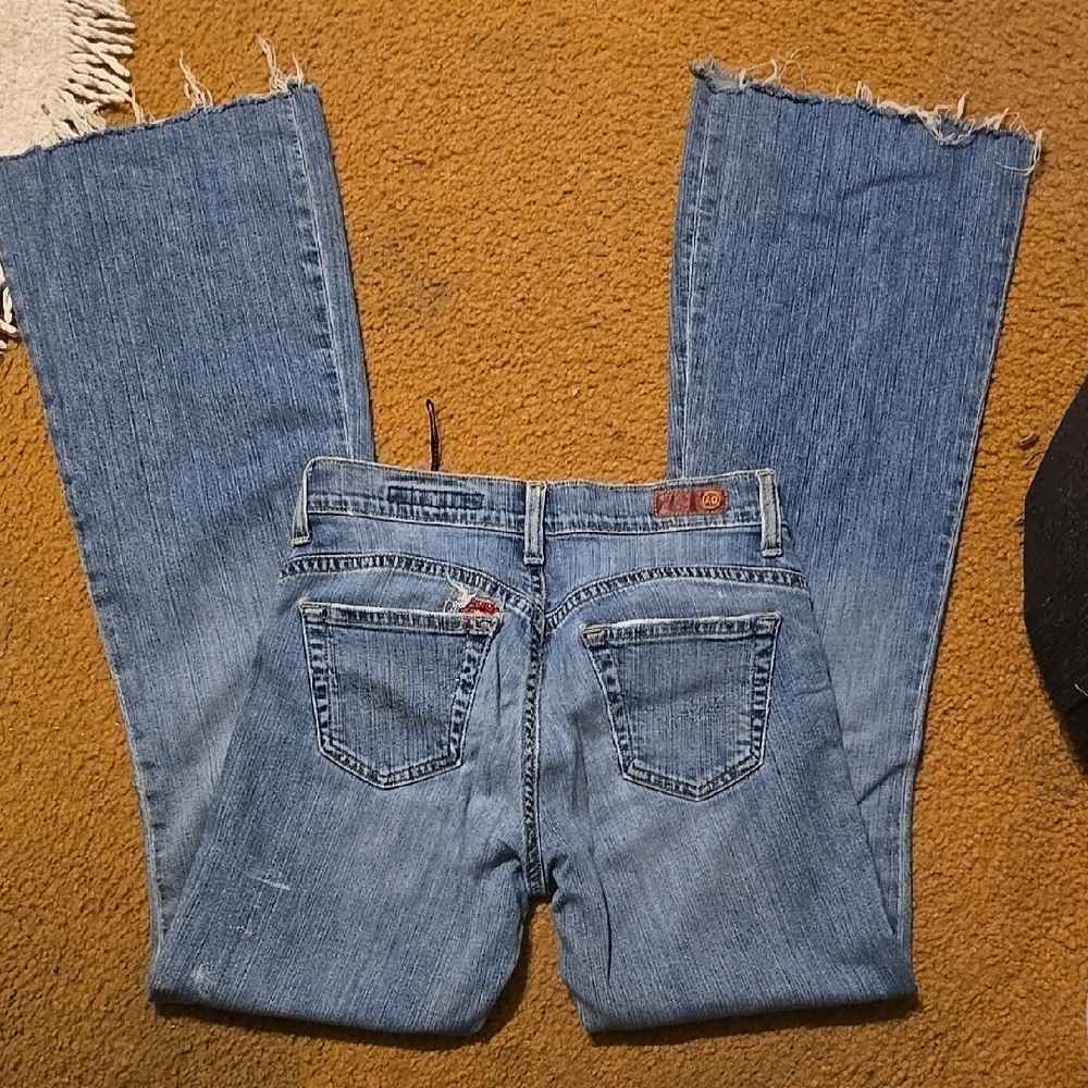 AG flare Jeans with Frayed Hems and Classic Denim Wash